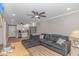 Spacious living room with an open-concept kitchen and a large sectional sofa at 191 Maison Dr. # B-323, Myrtle Beach, SC 29572