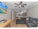 Open-concept living room and kitchen area with a comfortable sofa and modern appliances at 191 Maison Dr. # B-323, Myrtle Beach, SC 29572