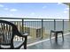 Private balcony overlooking the beach, perfect for relaxing and enjoying the coastal scenery at 205 74Th Ave. N # 1104, Myrtle Beach, SC 29572