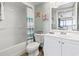 Bathroom featuring a shower-tub combo with nautical decorations at 205 74Th Ave. N # 1104, Myrtle Beach, SC 29572