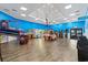Bright game room featuring various arcade games and a laundry room at 205 74Th Ave. N # 1104, Myrtle Beach, SC 29572