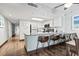 Bright kitchen featuring white cabinetry, stainless appliances, and bar seating at 205 74Th Ave. N # 1104, Myrtle Beach, SC 29572