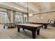 Community billiard room with two pool tables and stylish seating for relaxing and playing at 2089 Suncrest Dr., Myrtle Beach, SC 29577