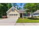 Charming single-Gathering home featuring a well-manicured lawn and an attached two-car garage at 2089 Suncrest Dr., Myrtle Beach, SC 29577