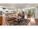 Open-concept living room and kitchen featuring hardwood floors and plenty of natural light at 2089 Suncrest Dr., Myrtle Beach, SC 29577