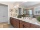 Bright bathroom with double vanity, quartz counters, glass shower, and tile flooring at 2089 Suncrest Dr., Myrtle Beach, SC 29577