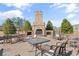 Outdoor stone fireplace and seating area, perfect for gathering with friends and Gathering at 2089 Suncrest Dr., Myrtle Beach, SC 29577