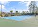 Outdoor tennis courts surrounded by lush landscaping offer a great recreational amenity at 2089 Suncrest Dr., Myrtle Beach, SC 29577