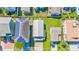 Aerial view of a home with solar panels, backyard, and metal roof at 209 25Th Ave. N, North Myrtle Beach, SC 29582
