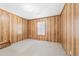 Bedroom with paneled walls, carpet and natural light at 209 25Th Ave. N, North Myrtle Beach, SC 29582