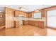 Classic kitchen features wood cabinets, hardwood flooring and recessed lighting at 209 25Th Ave. N, North Myrtle Beach, SC 29582