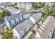 Scenic aerial shot of condo complex with a pool, near a tranquil waterway and lush landscaping at 209 Hillside Dr. N # 104, North Myrtle Beach, SC 29582