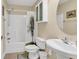 Bathroom featuring a shower/tub combo, toilet, sink, and cabinet at 209 Hillside Dr. N # 104, North Myrtle Beach, SC 29582