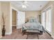 Inviting bedroom with coastal-themed bedding, balcony access, and ample closet space at 209 Hillside Dr. N # 104, North Myrtle Beach, SC 29582