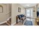 Welcoming foyer with tile flooring, an elegant bench, and a stylishly decorated entryway at 209 Hillside Dr. N # 104, North Myrtle Beach, SC 29582