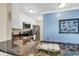Modern kitchen featuring granite countertops, stainless steel appliances, and white cabinetry at 209 Hillside Dr. N # 104, North Myrtle Beach, SC 29582