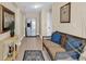 Cozy living area featuring tiled floors, and comfortable seating, perfect for relaxation and entertaining at 209 Hillside Dr. N # 104, North Myrtle Beach, SC 29582
