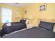 Bright bedroom featuring two twin beds, a window, and nautical-themed decor at 219 27Th Ave. N, North Myrtle Beach, SC 29582