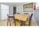 Cozy dining area next to laundry area featuring table with chairs at 219 27Th Ave. N, North Myrtle Beach, SC 29582
