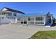 Charming single-story home featuring a blue metal roof, a welcoming front porch, and ample parking space at 219 27Th Ave. N, North Myrtle Beach, SC 29582