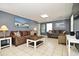 Comfortable living room featuring tile floors, a cozy seating arrangement, and neutral-toned walls at 219 27Th Ave. N, North Myrtle Beach, SC 29582