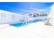 Beautiful in-ground pool with lounge chairs and an attractive fence, creating a relaxing backyard oasis at 219 27Th Ave. N, North Myrtle Beach, SC 29582