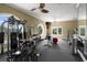 Well-equipped gym with a variety of weightlifting and cardio machines for a complete workout at 220 Waterfall Circle, Little River, SC 29566