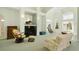 Spacious living room with high ceilings, a fireplace, and lots of natural light at 220 Waterfall Circle, Little River, SC 29566