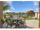 Outdoor patio with a beautiful view of the water, a table and chairs for relaxing and entertaining at 220 Waterfall Circle, Little River, SC 29566