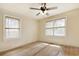 Bright bedroom with hardwood floors, two windows, and ceiling fan at 2206 Beck St., Georgetown, SC 29440
