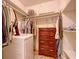 Well-organized closet featuring shelving, hanging rods, drawers, and in-unit laundry at 2206 Beck St., Georgetown, SC 29440