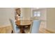 Cozy dining area with hardwood floors, light walls, and open view into the kitchen at 2206 Beck St., Georgetown, SC 29440