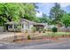 Charming single-story home featuring a screened-in porch and well-maintained landscaping at 2206 Beck St., Georgetown, SC 29440