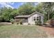 Charming single-story home features a screened porch and a well-maintained, shady front yard at 2206 Beck St., Georgetown, SC 29440