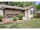 Attractive single-story home showcasing a screened porch and a neatly kept lawn with surrounding shrubbery at 2206 Beck St., Georgetown, SC 29440