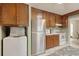 Kitchen featuring a stainless steel refrigerator, and white appliances with wooden cabinets at 2206 Beck St., Georgetown, SC 29440