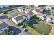 Aerial view of condos, ponds, green spaces, and parking at 2258 Essex Dr. # G, Surfside Beach, SC 29575