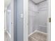 Walk-in closet with wire rack shelving and luxury vinyl plank floors at 2258 Essex Dr. # G, Surfside Beach, SC 29575