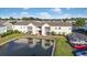 Condo exterior with outdoor seating and a pond in the background at 2258 Essex Dr. # G, Surfside Beach, SC 29575