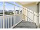 Screened-in porch boasts picturesque view of the pond, community and front door on the right at 2258 Essex Dr. # G, Surfside Beach, SC 29575