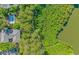 Overhead view of community pool, lake, and lush greenery providing a tranquil and scenic environment at 2312 Sweetwater Blvd. # 2312, Murrells Inlet, SC 29576