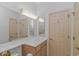 Bright bathroom featuring a vanity with wood cabinets and ample counter space at 2312 Sweetwater Blvd. # 2312, Murrells Inlet, SC 29576