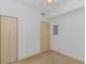 Bedroom with double closet and door at 2312 Sweetwater Blvd. # 2312, Murrells Inlet, SC 29576