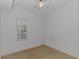 Bedroom with light from a window with blinds and a ceiling fan at 2312 Sweetwater Blvd. # 2312, Murrells Inlet, SC 29576