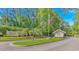 Community entrance with American flag and guardhouse at 2312 Sweetwater Blvd. # 2312, Murrells Inlet, SC 29576