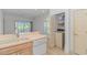 Kitchen with washer and dryer closet at 2312 Sweetwater Blvd. # 2312, Murrells Inlet, SC 29576