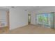 Spacious living room with sliding glass doors to an outside balcony at 2312 Sweetwater Blvd. # 2312, Murrells Inlet, SC 29576