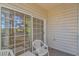 Sliding glass doors open to a covered patio with seating at 2312 Sweetwater Blvd. # 2312, Murrells Inlet, SC 29576