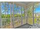 Relax on the screened porch with views of the trees at 2312 Sweetwater Blvd. # 2312, Murrells Inlet, SC 29576