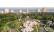 Beautiful aerial view of tennis courts, clubhouse, and mature trees near the ocean and local community at 234 Westleton Dr. # 21-C, Myrtle Beach, SC 29572